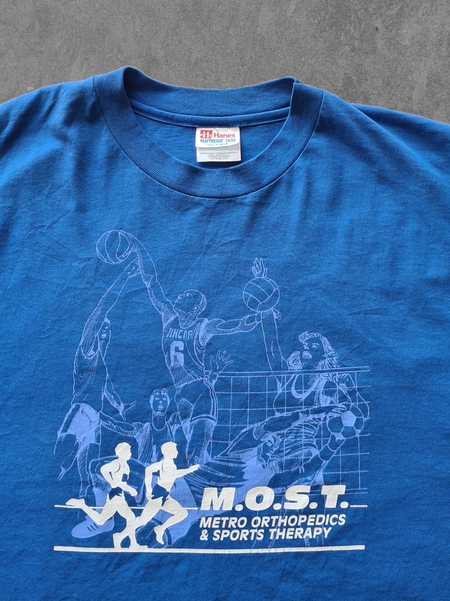 De vintage winkel met tweedehands kleding uit de thrift | 90s HANES ''M.O.S.T.'' T-SHIRT [XL] T-SHIRT